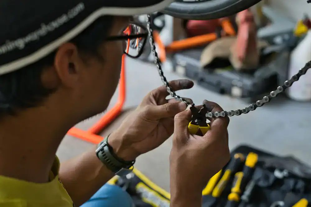Close up of bike mechanic tools and a gear cassette